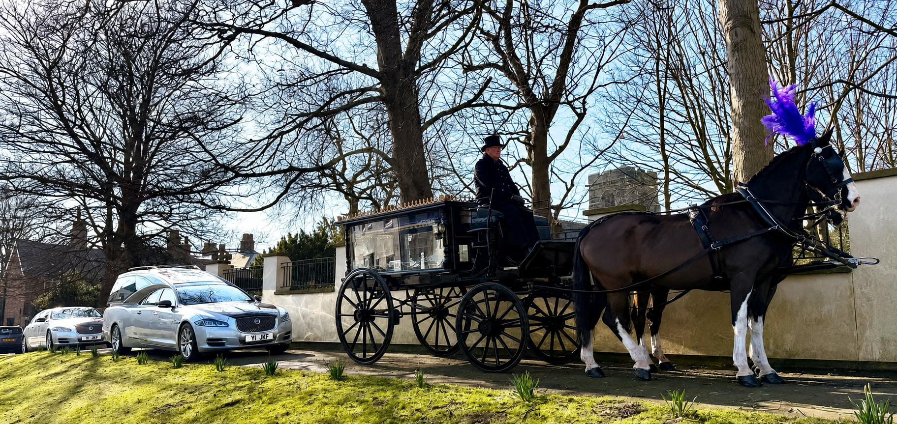 Horse drawn funeral carriage
